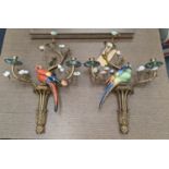 WALL SCONCES, a pair, 60cm x 43cm x 12cm, in the form of parrots amongst floral and foliate display,