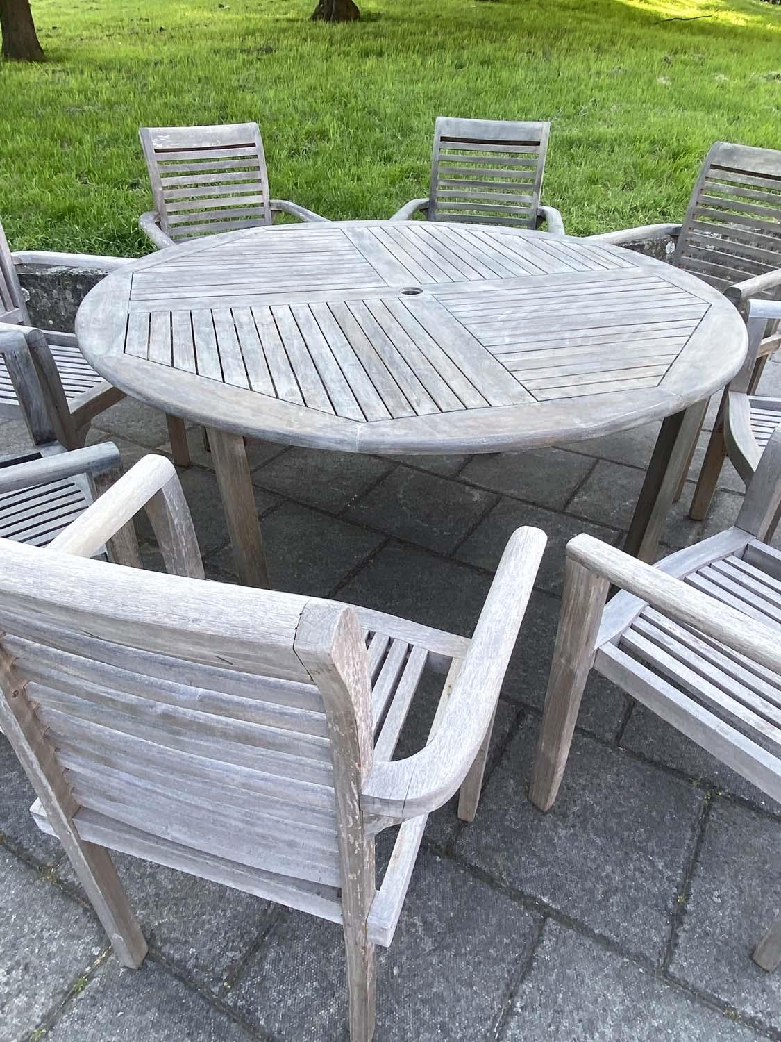 GARDEN TABLE AND ARMCHAIRS, weathered, eight stacking armchairs included 64cm W, table 130cm W. (9) - Image 3 of 5