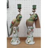 CANDELABRA, a pair, 36cm H, in the form of parrots, glazed ceramic, gilt metal mounts. (2)