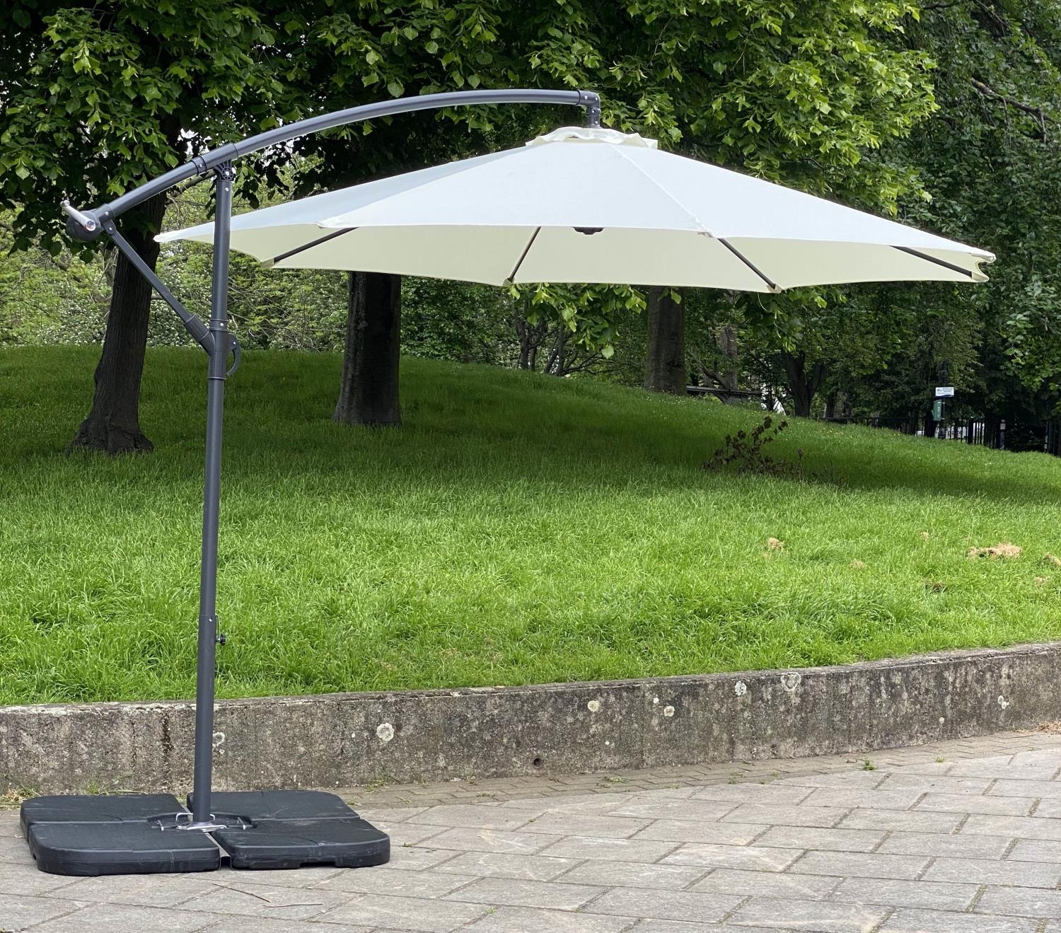 GARDEN PARASOL, circular cream canvas retractable wind up with frame and weights (water filled), - Image 2 of 5