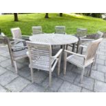 GARDEN TABLE AND ARMCHAIRS, weathered, eight stacking armchairs included 64cm W, table 130cm W. (9)