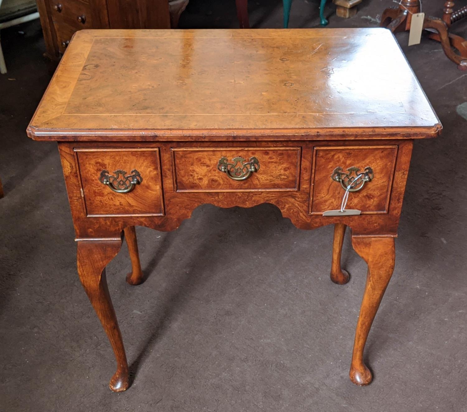 QUEEN ANNE STYLE LOWBOY, burr elm, fitted with three drawers, raised on cabriole legs, 70cm H x 69cm