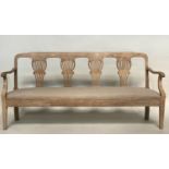 HALL SEAT, 19th century elm with triple pierced splat back, arms and linen upholstered drop in seat,