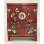 CHINOISERIE CABINET, Chinese scarlet lacquered and gilt decorated with two doors, 59cm x 28cm x 77cm
