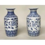 TEMPLE VASES, a pair, Chinese blue and white ceramic peonies and fern collar, 45cm H. (2)