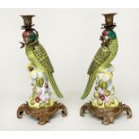 PARROT CANDLESTICKS, a pair, Continental style painted porcelain and gilt metal mounted, 37cm H. (2)