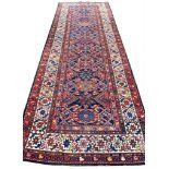 ANTIQUE NORTH WEST PERSIAN RUNNER, 310cm x 110cm.