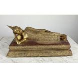 SLEEPING BRONZE BUDDAH, profusely decorated in gilt finish along with a seated resin Buddha in
