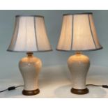 TABLE LAMPS, a Chinese cream ceramic of baluster vase form with crackelure effect and silk style