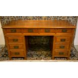 CHINESE PEDESTAL DESK, 152cm W x 83cm H x 70cm D elm with ten drawers and ornate handles.