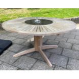 GARDEN TABLE, large circular teak with granite lazy Susan centre, by Neptune, 150cm W and a