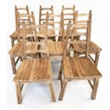 DINING CHAIRS, a set of eight, Arts and Crafts style oak each with tapering ladder back and