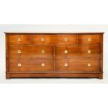 LOW CHEST, Campaign style mahogany and brass mounted with seven drawers, 153cm W x 48cm D x 74cm H.