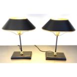 BOUILLOTTE STYLE TABLE LAMPS, a pair, 42cm x 31cm x 20cm, in black and gold, shades. (2)