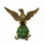 EAGLE FINIAL STATUE, gilt metal and green painted, 35cm H.