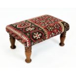 KILIM FOOTSTOOL, raised on turned wooden legs, 32cm H x 65cm x 42cm.