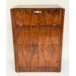 COCKTAIL CABINET, Art Deco period figured walnut with rising lid enclosing lit fitted interior above