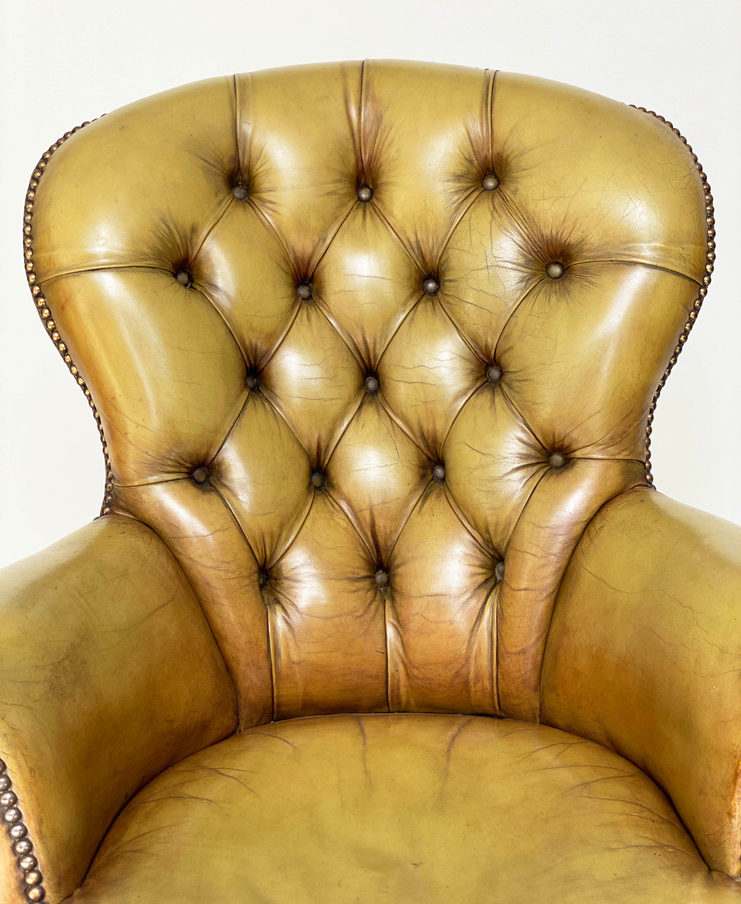 LIBRARY ARMCHAIR, Edwardian mahogany with brass studded and deep buttoned green leather upholstery - Image 3 of 10