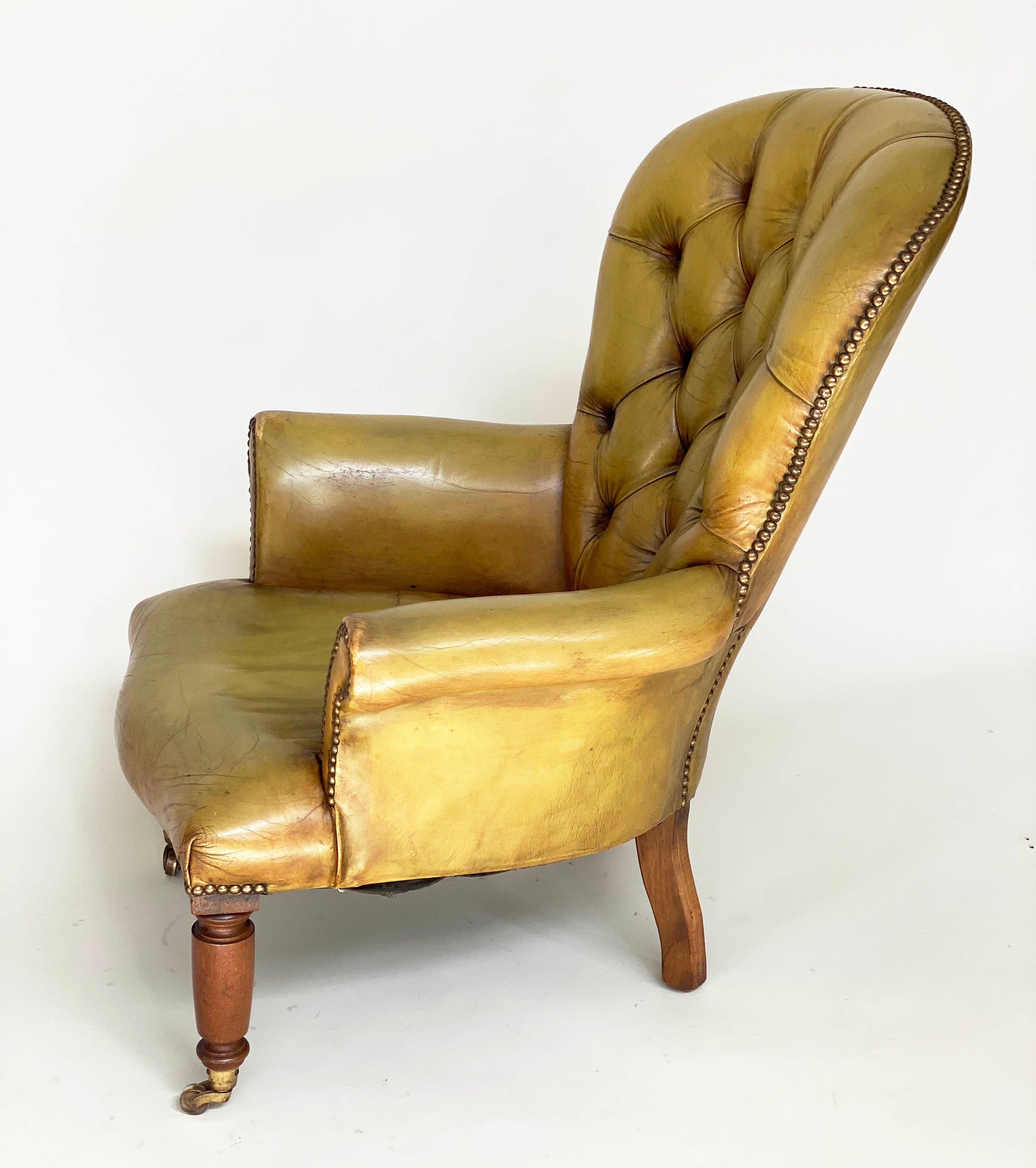 LIBRARY ARMCHAIR, Edwardian mahogany with brass studded and deep buttoned green leather upholstery - Image 10 of 10