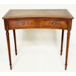 LEATHER WRITING TABLE, George III design flame mahogany of concave outline with tooled leather
