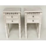 BEDSIDE CHESTS, a pair, French style traditionally grey painted each with pierced frieze and two