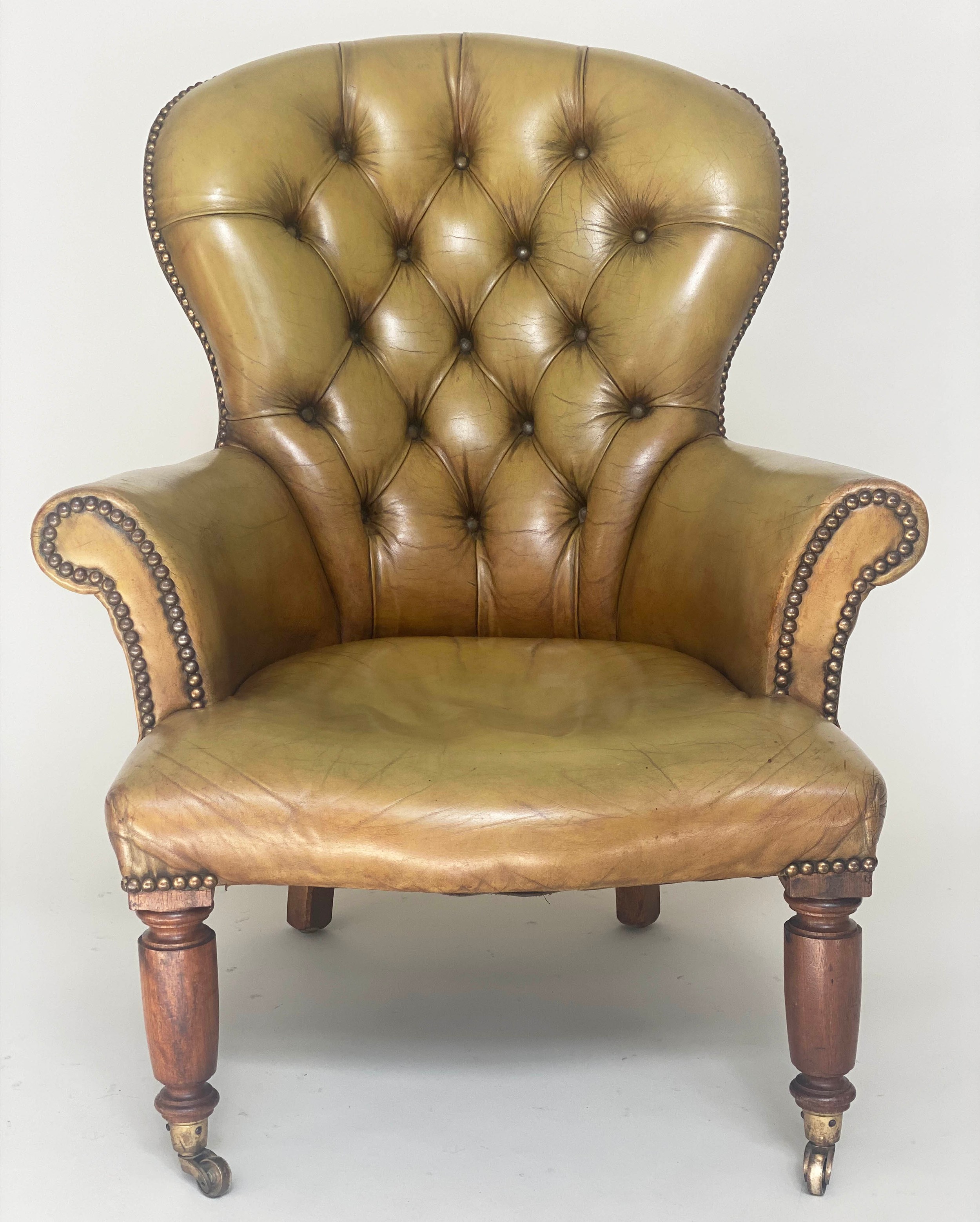 LIBRARY ARMCHAIR, Edwardian mahogany with brass studded and deep buttoned green leather upholstery - Image 7 of 10