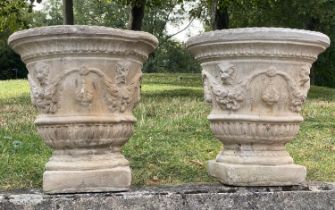 PLANTERS, a pair, 51cm diam. x 52cm H, weathered reconstituted stone, of neo Classical form, with