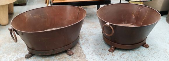 PLANTERS, a pair, 75cm x 59cm x 32cm, oxidised metal, ring handles and claw feet. (2)