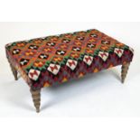 HEARTH STOOL, 39cm H x 104cm W x 62cm D, kilim design upholstered, on beechwood legs.