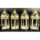 STORM LANTERNS, a set of four, Regency style, gilt metal, 46cm H x 19cm diam. (4)