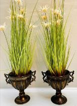 FAUX PLANTS, pair, 80cm H x 30cm W approx., in twin handled pedestal urns, antique finish. (2)