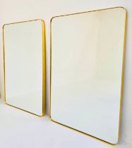 WALL MIRRORS, a pair, 1960s French style, gilt framed, 121cm high x 80cm wide. (2)