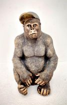 GORILLA WEARING A BASEBALL CAP, 60cm H x 40cm W x 34cm D, faux bronze finish resin.