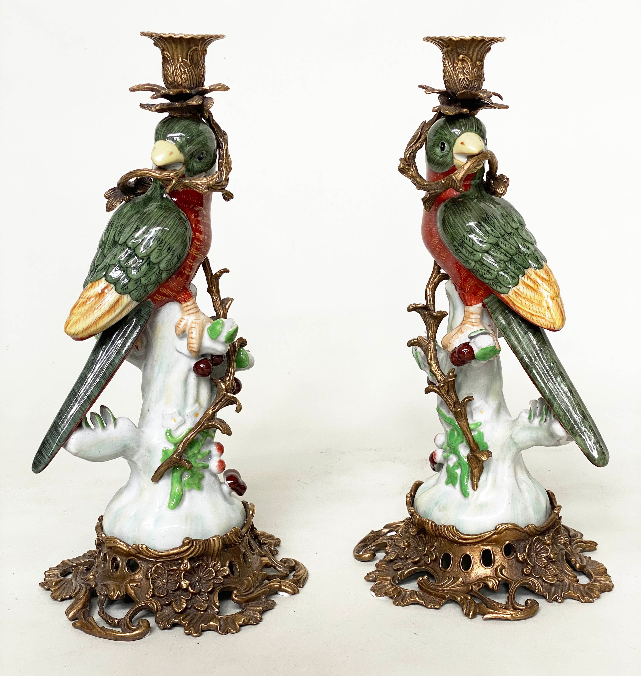 PARROTT CANDLESTICKS, a pair, 36cm H, Continental style, painted porcelain, with gilt metal