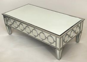 LOW TABLE, silvered wood and glazed with bevelled mirror throughout and tapering supports, 117cm x