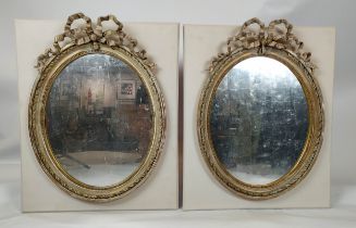 WALL MIRRORS, a pair, Louis XVI style, applied to later boards, painted finish, 19th century oval