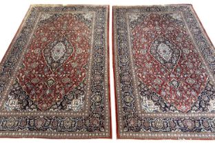 KASHAN RUGS, a pair, 230cm x 144cm. (2)