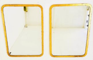 WALL MIRRORS, a pair, 96cm H x 68cm W, gilt metal frames. (2)
