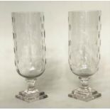 STORM LANTERNS, a pair, 45cm H, cut and engraved glass, with stepped plinth. (2)
