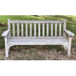 LISTER GARDEN BENCH, well weathered teak slatted with broad flat top arms, 162cm W.