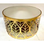 LOW TABLE, 40cm H x 74cm diam., 1970s Italian style, gilt metal, mirrored glass top, leaf pierced