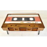 LOW TABLE, 40cm high x 110cm wide x 60cm deep, cassette tape design, with storage to one side.