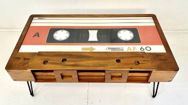LOW TABLE, 40cm high x 110cm wide x 60cm deep, cassette tape design, with storage to one side.