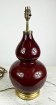 CHINESE DOUBLE GOURD VASE LAMP, with a deep ox-blood red glaze, 50cm H.