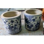 PLANTERS, a pair, 50cm high, 48cm diameter, Chinese export style blue and white ceramic. (2)