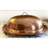 MEAT PLATE AND COVER, early 20th century hand beaten copper oval plate with cover tamped to plate