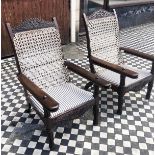 PLANTERS CHAIRS, 100cm H , 65cm W, a pair, carved hardwood with string backs, padded ticking seats