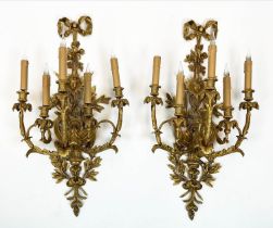 WALL SCONCES, a pair, each 95cm x 40cm, late 19th century French gilt bronze with ribbon, floral,