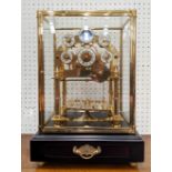 CONGREVE CLOCK, 30cm x 27cm, in glass case, moon phase function, comes with box.