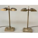 DESK LAMPS, a pair, nickel and brass by Besselink and Jones each with dual hooded lamps and weighted